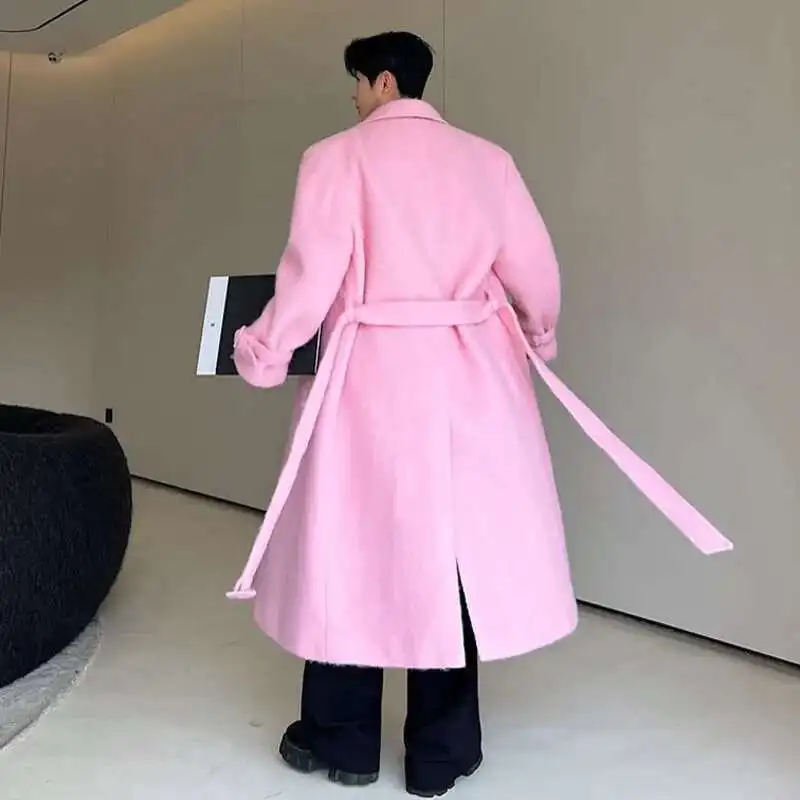 Classic wool double breasted overcoat with belt showing elegant silhouette