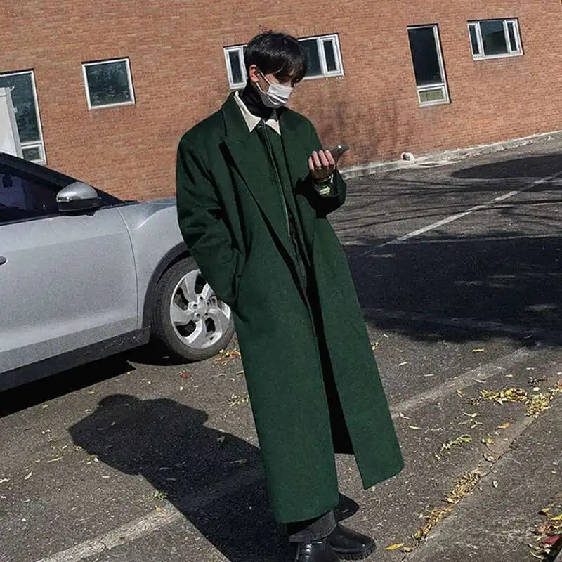 Wool car coat styled with winter accessories including scarf and gloves