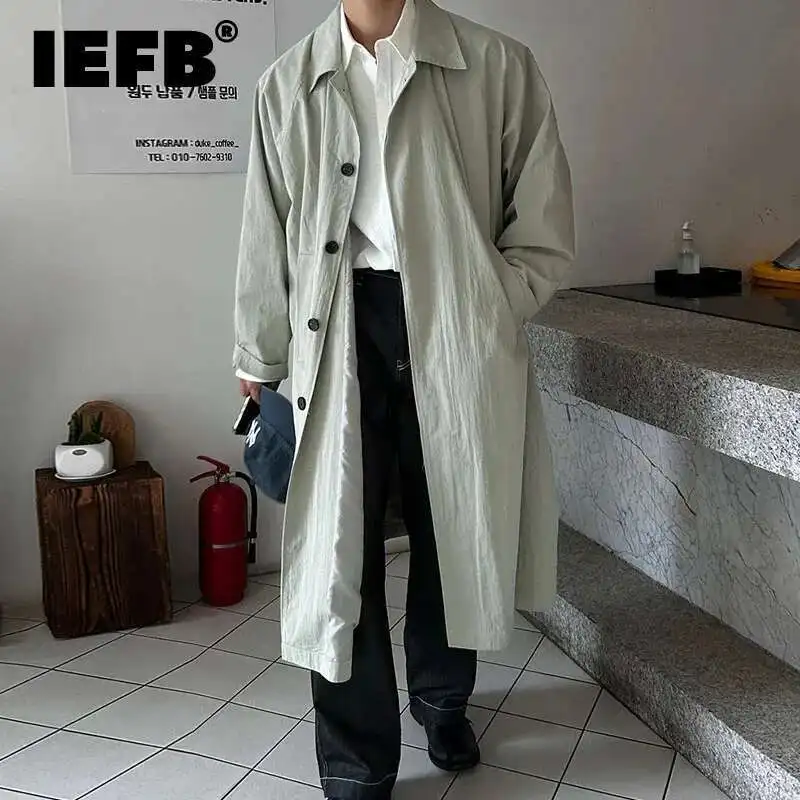 Professional man wearing double breasted coat for business setting